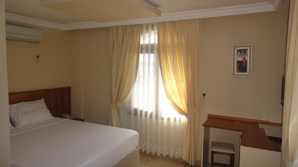Golden Stone Butik Otel Кешме Номер фото